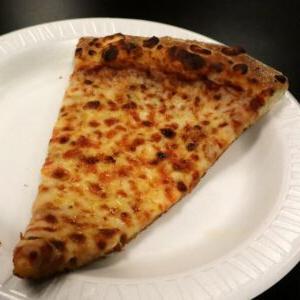 A single slice of pizza from the cafeteria at Dayspring Christian Academy in Lancaster, PA
